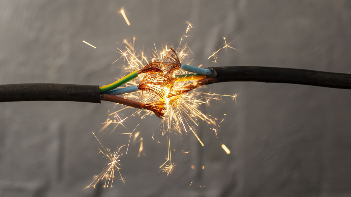 A broken wire causing a spark